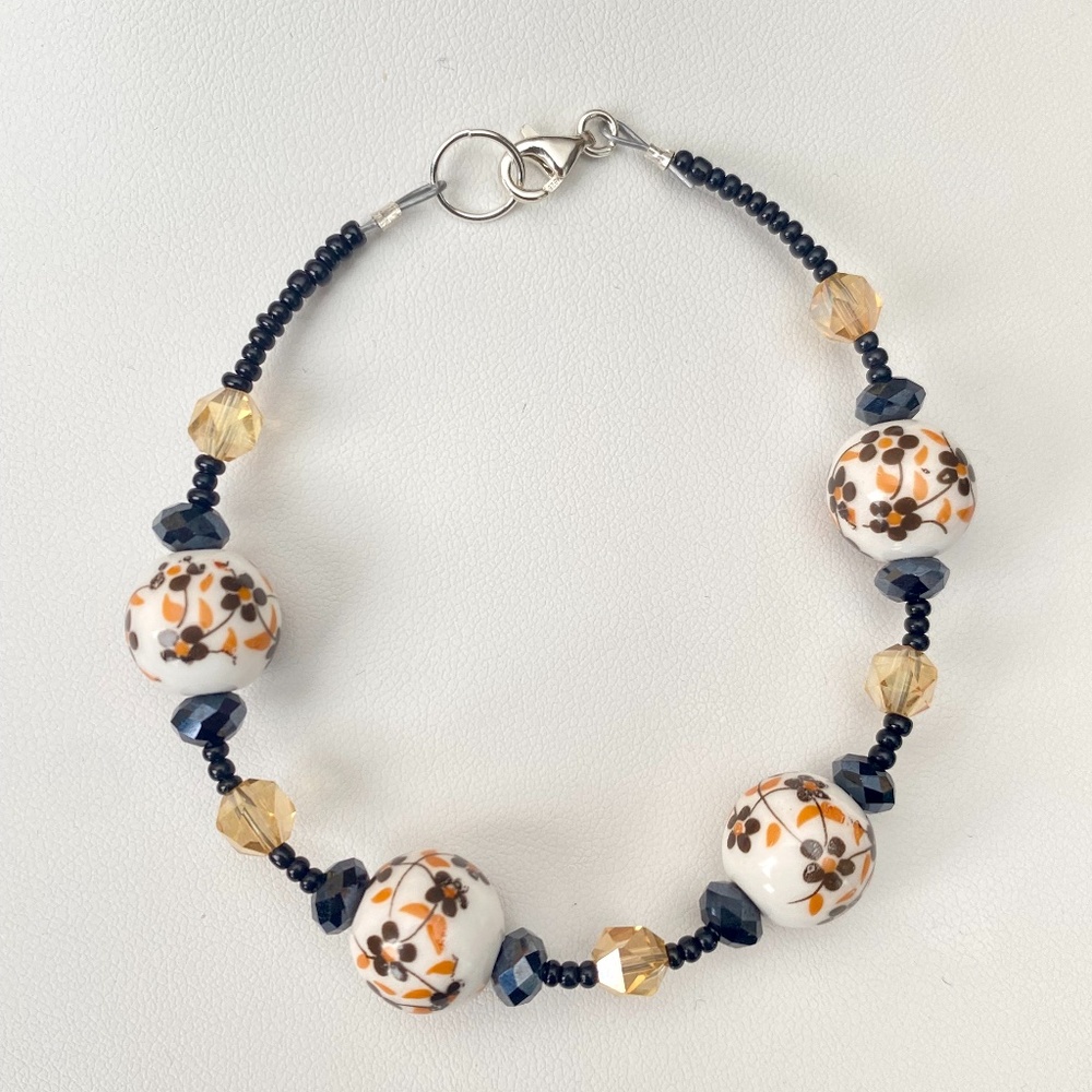 Black & Orange Floral Beaded Ceramic & Glass Bracelet